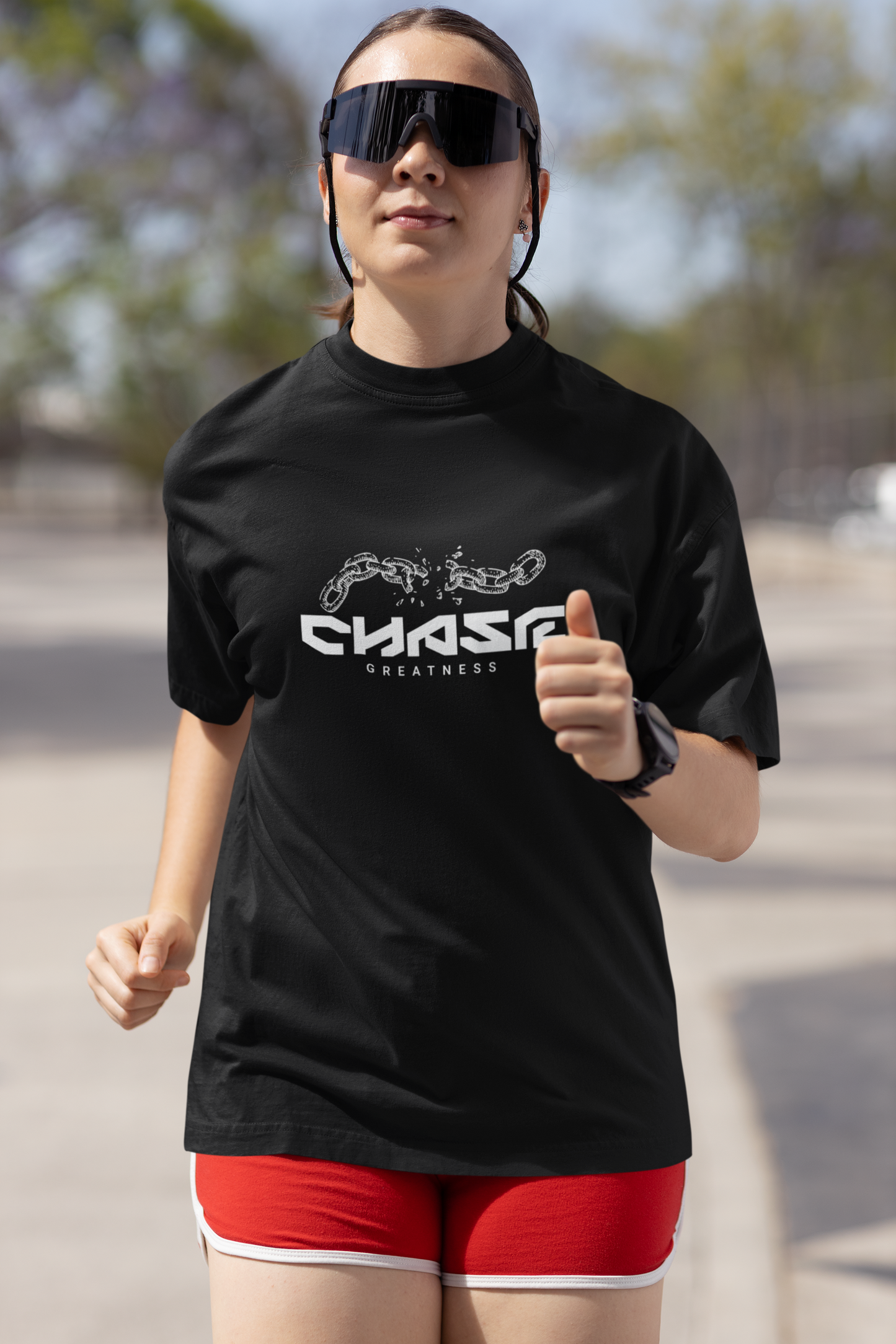 CHASE GREATNESS – Women’s Oversized Black T-Shirt by Teenate